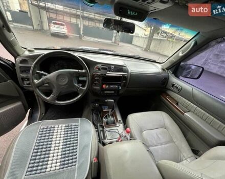 Синий Ниссан Патрол, объемом двигателя 3 л и пробегом 390 тыс. км за 12500 $, фото 10 на Automoto.ua