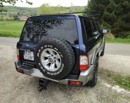 Синий Ниссан Патрол, объемом двигателя 3 л и пробегом 273 тыс. км за 3950 $, фото 5 на Automoto.ua