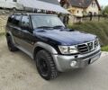 Синий Ниссан Патрол, объемом двигателя 3 л и пробегом 273 тыс. км за 3950 $, фото 2 на Automoto.ua