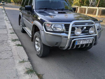 Синий Ниссан Патрол, объемом двигателя 2.95 л и пробегом 355 тыс. км за 10500 $, фото 1 на Automoto.ua