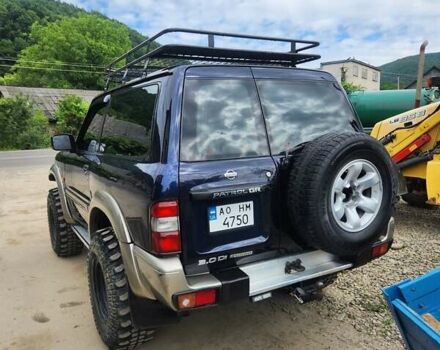 Синій Ніссан Патрол, об'ємом двигуна 3 л та пробігом 221 тис. км за 19700 $, фото 1 на Automoto.ua