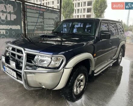 Синий Ниссан Патрол, объемом двигателя 3 л и пробегом 390 тыс. км за 12500 $, фото 1 на Automoto.ua