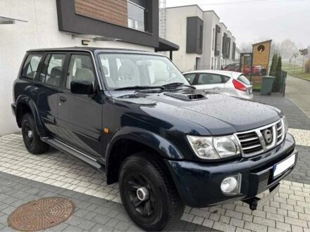 Синій Ніссан Патрол, об'ємом двигуна 3 л та пробігом 174 тис. км за 9482 $, фото 1 на Automoto.ua
