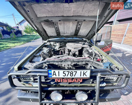 Зеленый Ниссан Патрол, объемом двигателя 3.2 л и пробегом 283 тыс. км за 12000 $, фото 6 на Automoto.ua