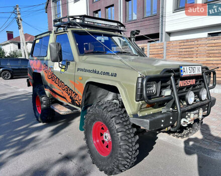 Зеленый Ниссан Патрол, объемом двигателя 3.2 л и пробегом 283 тыс. км за 12000 $, фото 2 на Automoto.ua