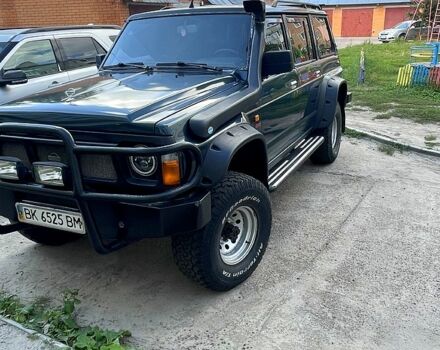 Зеленый Ниссан Патрол, объемом двигателя 3 л и пробегом 200 тыс. км за 9500 $, фото 2 на Automoto.ua
