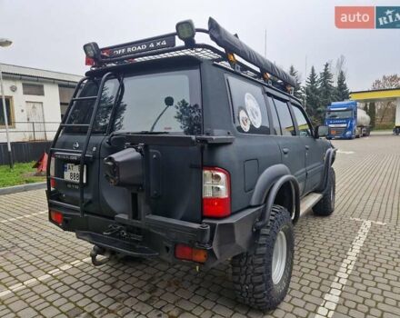 Зелений Ніссан Патрол, об'ємом двигуна 2.8 л та пробігом 198 тис. км за 19999 $, фото 12 на Automoto.ua