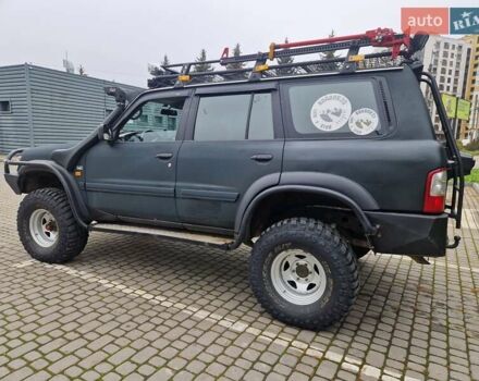 Зелений Ніссан Патрол, об'ємом двигуна 2.8 л та пробігом 198 тис. км за 19999 $, фото 9 на Automoto.ua