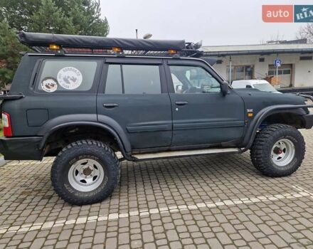 Зелений Ніссан Патрол, об'ємом двигуна 2.8 л та пробігом 198 тис. км за 19999 $, фото 15 на Automoto.ua