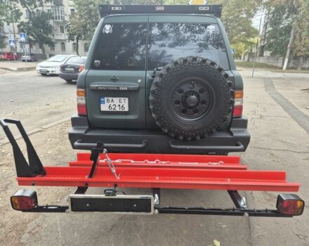 Зеленый Ниссан Патрол, объемом двигателя 4.2 л и пробегом 427 тыс. км за 35000 $, фото 23 на Automoto.ua