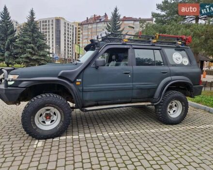 Зелений Ніссан Патрол, об'ємом двигуна 2.8 л та пробігом 198 тис. км за 19999 $, фото 8 на Automoto.ua