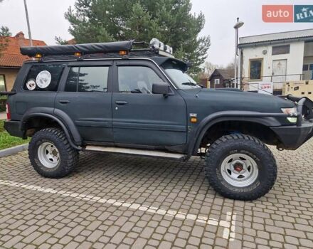 Зелений Ніссан Патрол, об'ємом двигуна 2.8 л та пробігом 198 тис. км за 19999 $, фото 16 на Automoto.ua