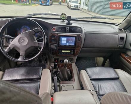 Зелений Ніссан Патрол, об'ємом двигуна 2.8 л та пробігом 198 тис. км за 19999 $, фото 21 на Automoto.ua