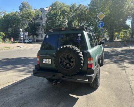 Зеленый Ниссан Патрол, объемом двигателя 4.2 л и пробегом 427 тыс. км за 35000 $, фото 18 на Automoto.ua