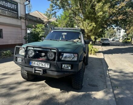 Зеленый Ниссан Патрол, объемом двигателя 4.2 л и пробегом 427 тыс. км за 35000 $, фото 19 на Automoto.ua