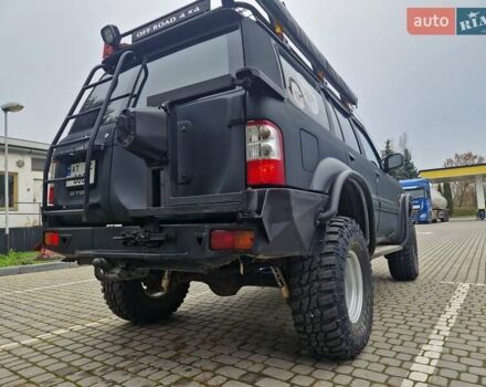 Зелений Ніссан Патрол, об'ємом двигуна 2.8 л та пробігом 198 тис. км за 19999 $, фото 13 на Automoto.ua