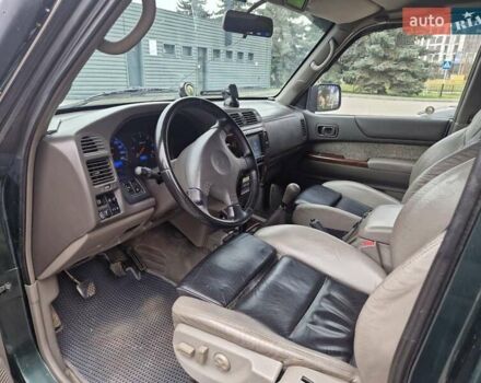 Зелений Ніссан Патрол, об'ємом двигуна 2.8 л та пробігом 198 тис. км за 19999 $, фото 20 на Automoto.ua