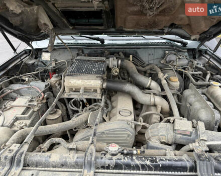 Зелений Ніссан Патрол, об'ємом двигуна 2.83 л та пробігом 254 тис. км за 11800 $, фото 14 на Automoto.ua