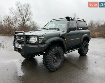 Зелений Ніссан Патрол, об'ємом двигуна 2.83 л та пробігом 254 тис. км за 11800 $, фото 4 на Automoto.ua