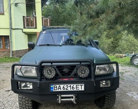Зеленый Ниссан Патрол, объемом двигателя 4.2 л и пробегом 427 тыс. км за 35000 $, фото 1 на Automoto.ua
