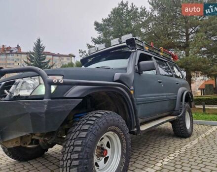 Зелений Ніссан Патрол, об'ємом двигуна 2.8 л та пробігом 198 тис. км за 19999 $, фото 27 на Automoto.ua