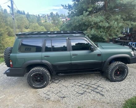 Зеленый Ниссан Патрол, объемом двигателя 4.2 л и пробегом 427 тыс. км за 35000 $, фото 3 на Automoto.ua