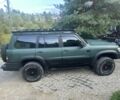 Зеленый Ниссан Патрол, объемом двигателя 4.2 л и пробегом 427 тыс. км за 35000 $, фото 3 на Automoto.ua
