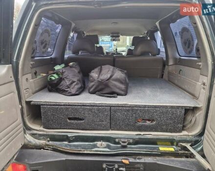 Зелений Ніссан Патрол, об'ємом двигуна 2.8 л та пробігом 198 тис. км за 19999 $, фото 29 на Automoto.ua