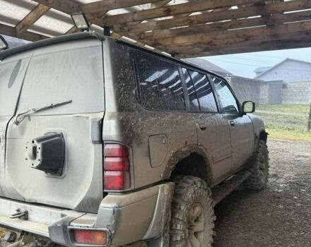 Зеленый Ниссан Патрол, объемом двигателя 2.8 л и пробегом 400 тыс. км за 16000 $, фото 2 на Automoto.ua