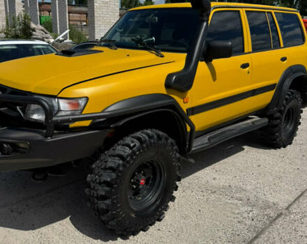 Зеленый Ниссан Патрол, объемом двигателя 4.2 л и пробегом 270 тыс. км за 26800 $, фото 4 на Automoto.ua