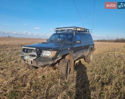Зеленый Ниссан Патрол, объемом двигателя 2.8 л и пробегом 312 тыс. км за 21500 $, фото 1 на Automoto.ua