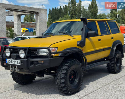 Зеленый Ниссан Патрол, объемом двигателя 4.2 л и пробегом 270 тыс. км за 26800 $, фото 2 на Automoto.ua