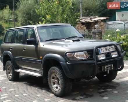 Зеленый Ниссан Патрол, объемом двигателя 2.8 л и пробегом 369 тыс. км за 16000 $, фото 1 на Automoto.ua