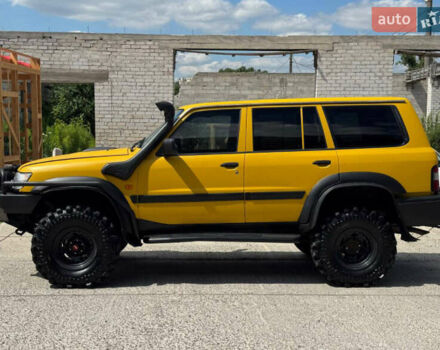 Зеленый Ниссан Патрол, объемом двигателя 4.2 л и пробегом 270 тыс. км за 26800 $, фото 6 на Automoto.ua