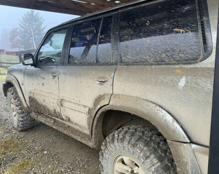 Зеленый Ниссан Патрол, объемом двигателя 2.8 л и пробегом 400 тыс. км за 16000 $, фото 1 на Automoto.ua