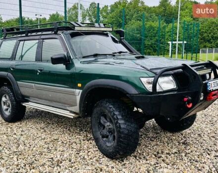 Зеленый Ниссан Патрол, объемом двигателя 3 л и пробегом 323 тыс. км за 16500 $, фото 4 на Automoto.ua