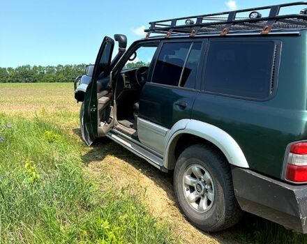 Зелений Ніссан Патрол, об'ємом двигуна 3 л та пробігом 275 тис. км за 11000 $, фото 6 на Automoto.ua