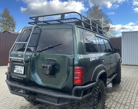 Зеленый Ниссан Патрол, объемом двигателя 3 л и пробегом 47 тыс. км за 16000 $, фото 6 на Automoto.ua