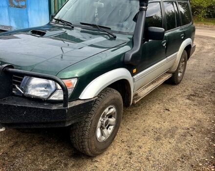 Зелений Ніссан Патрол, об'ємом двигуна 3 л та пробігом 275 тис. км за 11000 $, фото 3 на Automoto.ua