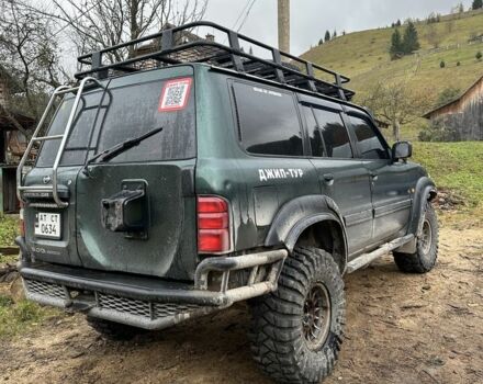 Зеленый Ниссан Патрол, объемом двигателя 3 л и пробегом 47 тыс. км за 16000 $, фото 13 на Automoto.ua