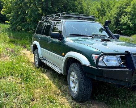 Зелений Ніссан Патрол, об'ємом двигуна 3 л та пробігом 275 тис. км за 11000 $, фото 5 на Automoto.ua