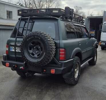 Зеленый Ниссан Патрол, объемом двигателя 2.95 л и пробегом 350 тыс. км за 27900 $, фото 2 на Automoto.ua