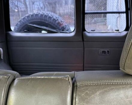 Зеленый Ниссан Патрол, объемом двигателя 3 л и пробегом 377 тыс. км за 14900 $, фото 13 на Automoto.ua