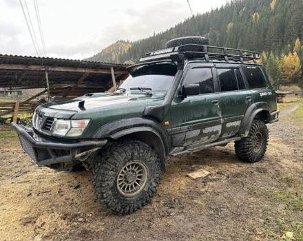 Зеленый Ниссан Патрол, объемом двигателя 3 л и пробегом 47 тыс. км за 16000 $, фото 12 на Automoto.ua