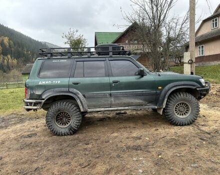 Зеленый Ниссан Патрол, объемом двигателя 3 л и пробегом 47 тыс. км за 16000 $, фото 11 на Automoto.ua