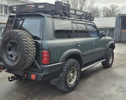 Зеленый Ниссан Патрол, объемом двигателя 2.95 л и пробегом 350 тыс. км за 27900 $, фото 16 на Automoto.ua