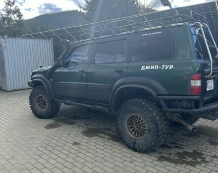 Зеленый Ниссан Патрол, объемом двигателя 3 л и пробегом 47 тыс. км за 16000 $, фото 4 на Automoto.ua