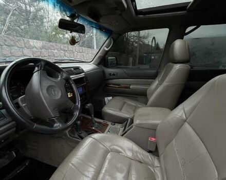 Зелений Ніссан Патрол, об'ємом двигуна 3 л та пробігом 446 тис. км за 15000 $, фото 19 на Automoto.ua