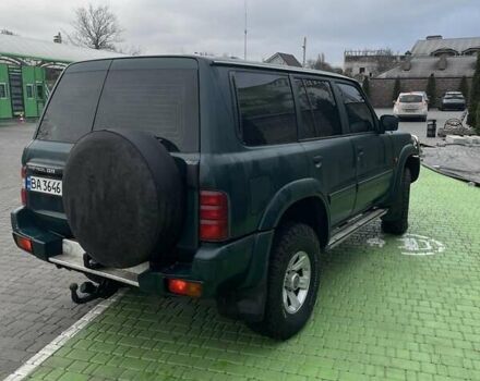 Зелений Ніссан Патрол, об'ємом двигуна 3 л та пробігом 446 тис. км за 15000 $, фото 3 на Automoto.ua