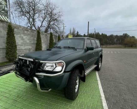 Зелений Ніссан Патрол, об'ємом двигуна 3 л та пробігом 446 тис. км за 15000 $, фото 13 на Automoto.ua